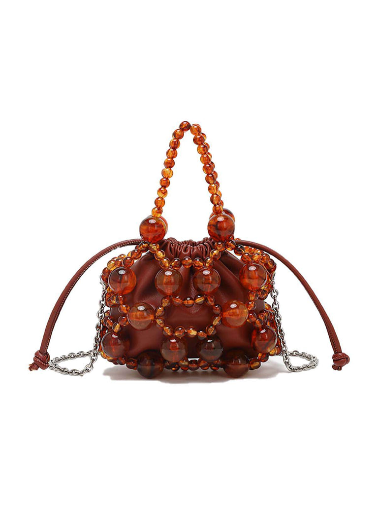 Mini sac seau à cordon de serrage et perles métalliques