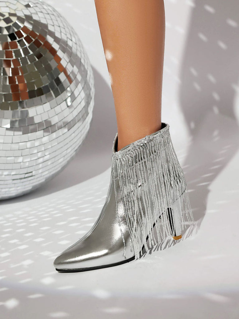 Bottines Chelsea à bout pointu et pompons métalliques