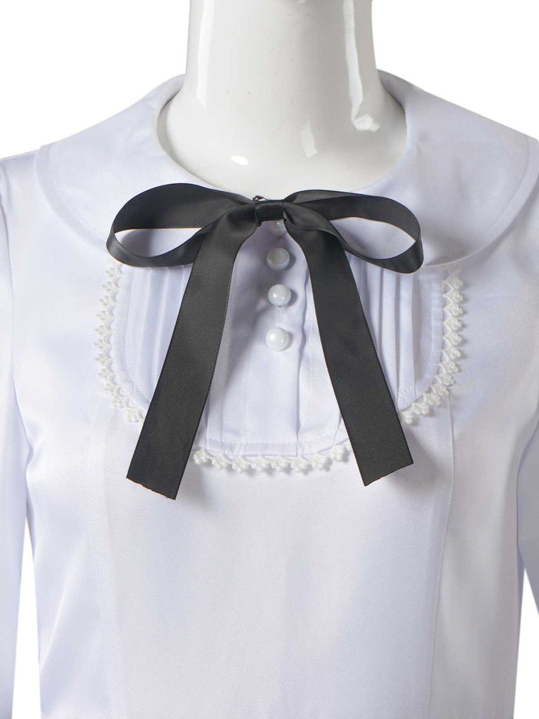 Robe grise à carreaux avec nœud et col claudine des années 1940