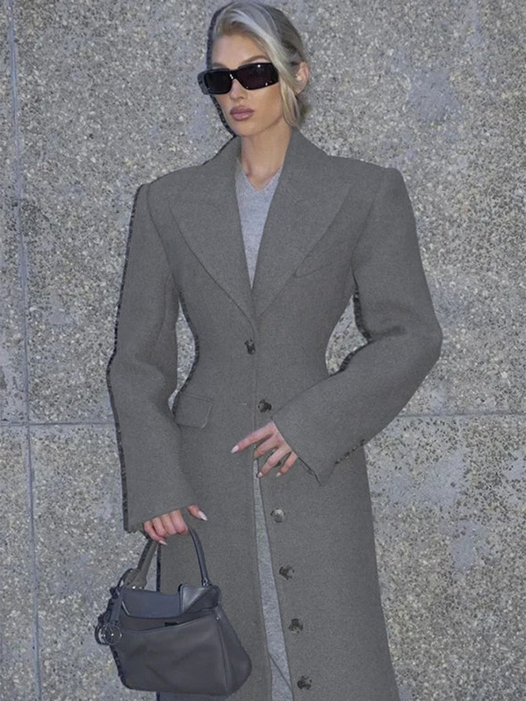 Manteau longue gris à boutons col revers unis des années 1930