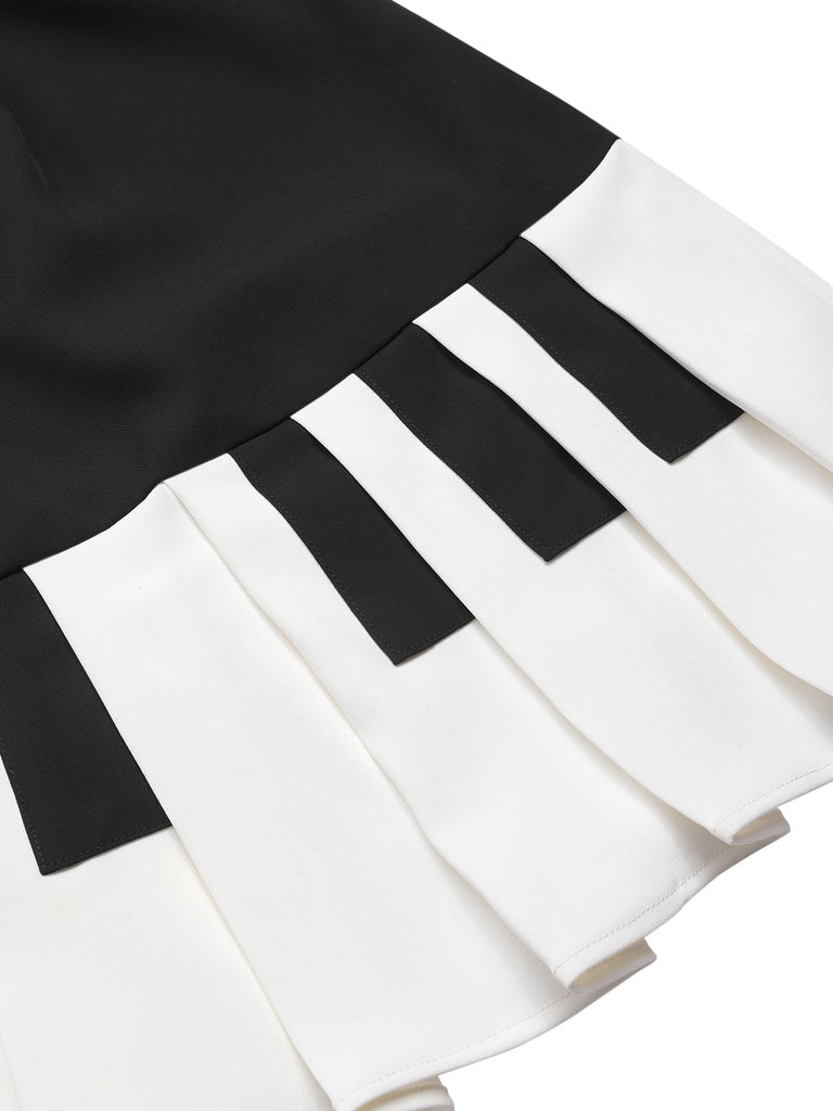 Robe noire patchwork à col bateau et touches de piano des années 1960