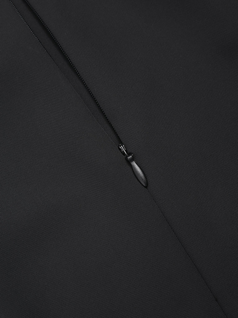 Robe noire patchwork à col bateau et touches de piano des années 1960