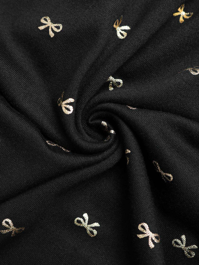 Robe fendue en dentelle noire col en V et nœud en feuille d'or des années 1930