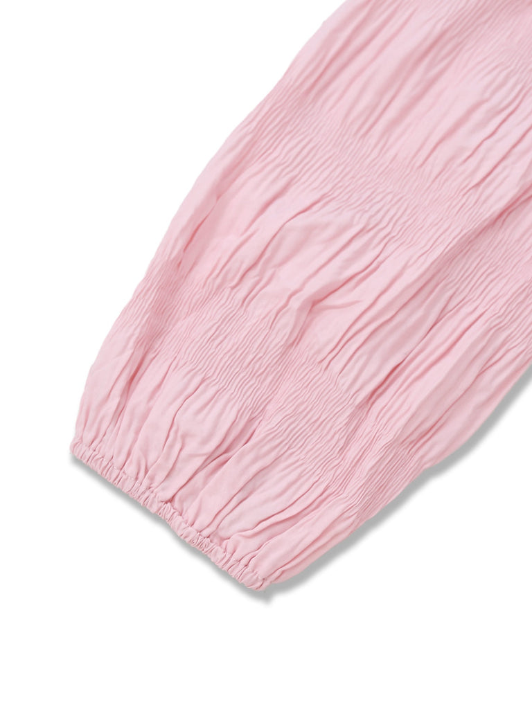 Robe rose plissée à col à volants années 1950