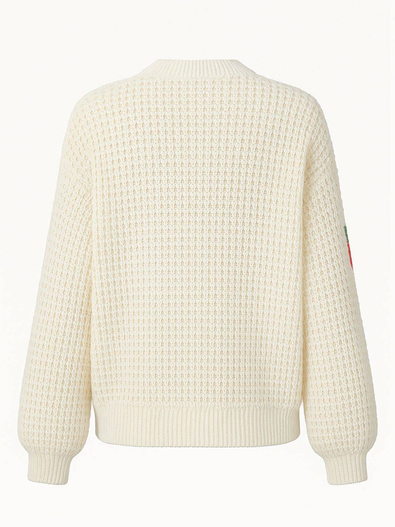 Cardigan beige en tricot fraise col v des années 1950