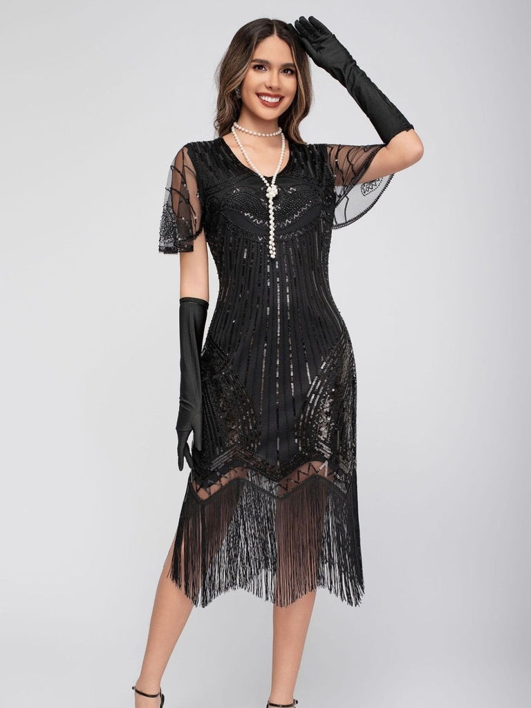 Robe Charleston à paillettes et pompons col rond années 1920