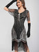 Robe Charleston à paillettes et pompons col rond années 1920