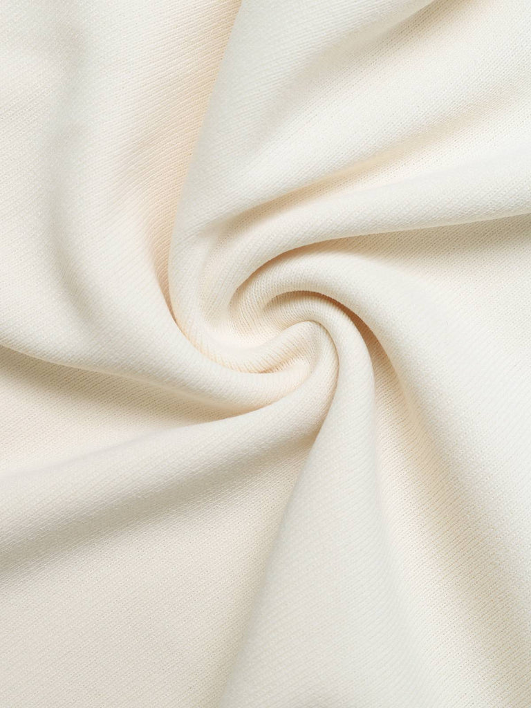 Haut beige uni à col à revers et volants années 1950