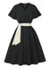 Robe cape noire à col en V et ceinture années 1950