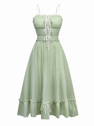 Robe verte à bretelles spaghetti et nœud papillon années 1940