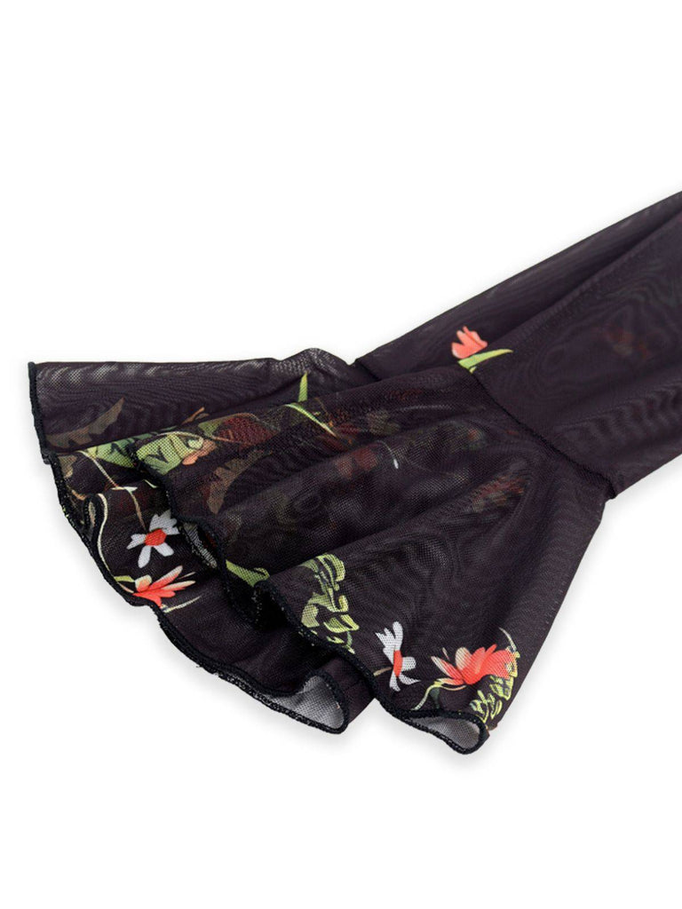 Robe longue noire fleurie à volants en maille années 1930