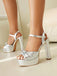 Sandales à talons hauts compensés à imprimé serpent métallisé