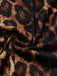Detail: 1980s Leopard Lace Bodysuit with Apron Lingerie Set, retro fashion design, perfect for vintage fashion lovers