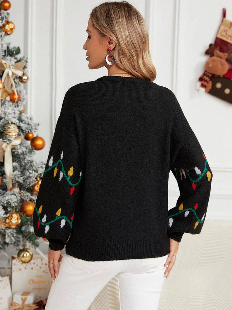 Pull en tricot noire à motifs de lumières de Noël années 1960