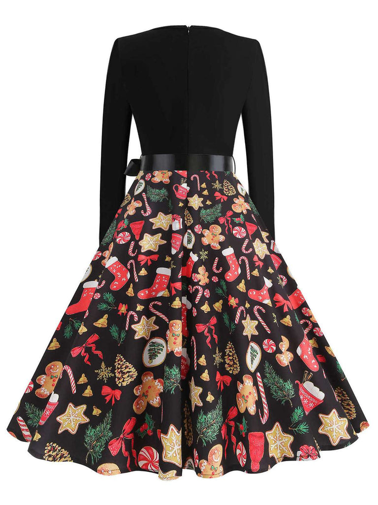 Robe noire de Noël motifs de pain d'épice et de cannes années 1950