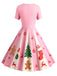[Prévente] Robe trapèze rouge et verte motif flocon de neige des années 1950
