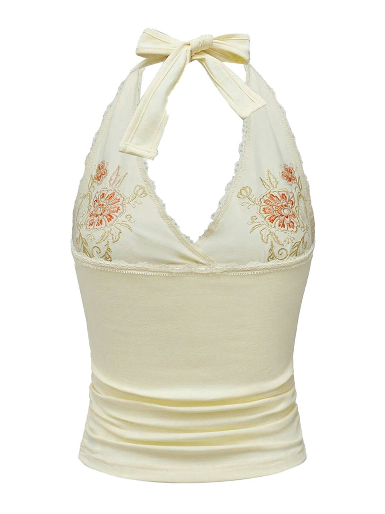 Haut dos nu fleuri en dentelle brodée ivoire années 1980