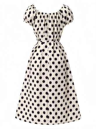 Robe beige à pois et manches bouffantes des années 1940