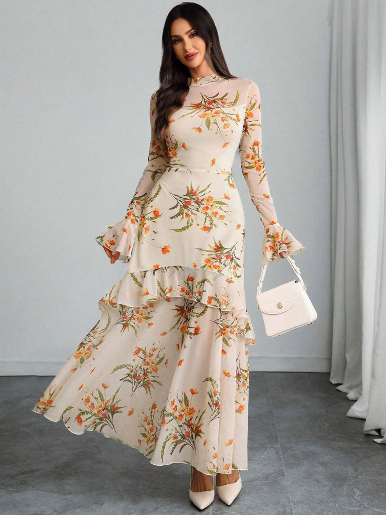 Robe longue noire fleurie à volants en maille années 1930