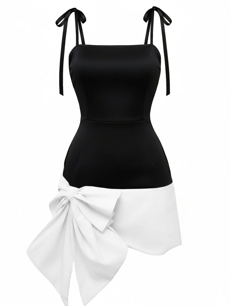 Robe noire à col carré et nœud papillon rouge années 60