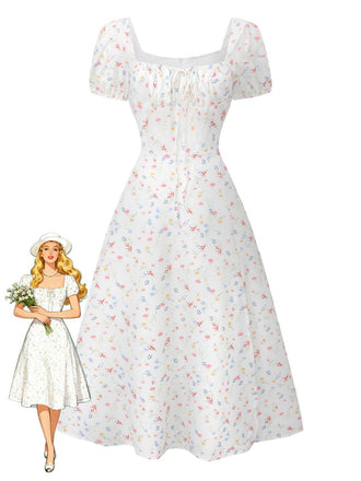 Robe blanche à fleurs col carré et manches bouffantes années 1930