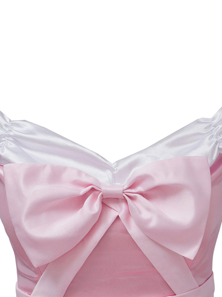 Robe rose à épaules dénudées plissée et ornée d'un nœud en satin années 50