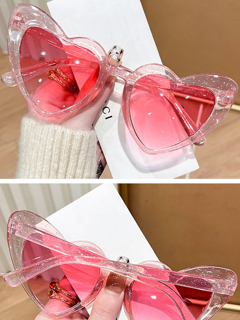 Lunettes de soleil à monture en forme de cœur incurvée