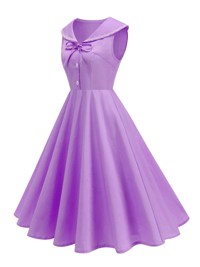 Robe sans manches col marin et nœud papillon couleur unie années 1950
