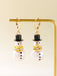 Boucles d'oreilles bonhomme de neige en strass flocons de neige et perles