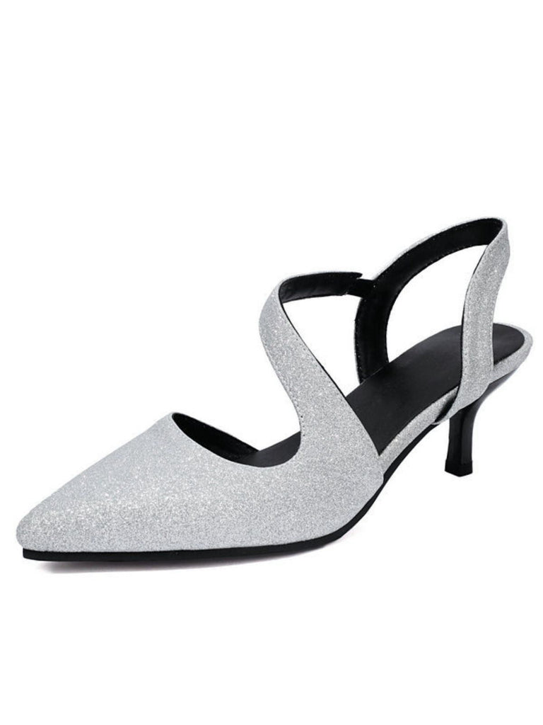 Escarpins professionnels à bout pointu et petit talon, dotés d'une finition légèrement scintillante, idéaux pour un style professionnel moderne et une tenue d'affaires.