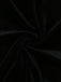 Close-up of black fabric with a swirling pattern
