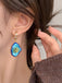 Boucles d'Oreilles Pendantes Fleur Bleue Vintage