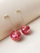 Boucles d'oreilles pendantes en forme de cerises séchées rouges - style vintage et rétro, élégantes