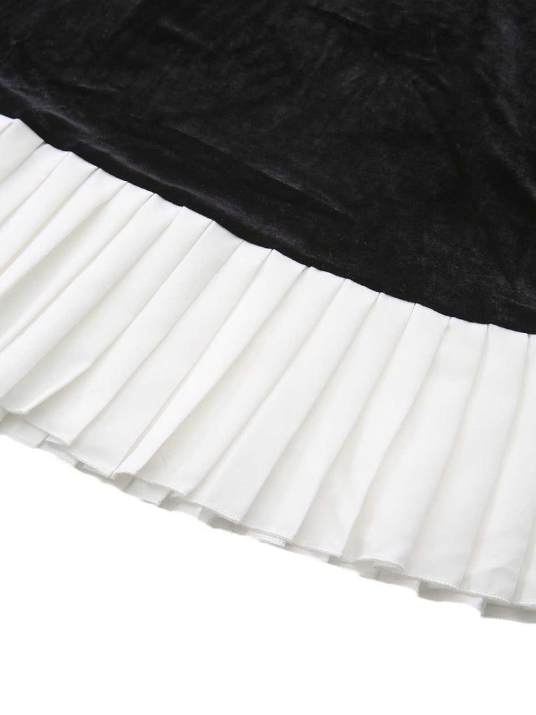 Robe col cœur et ourlet plissé en velours noir et blanc contrastée années 60