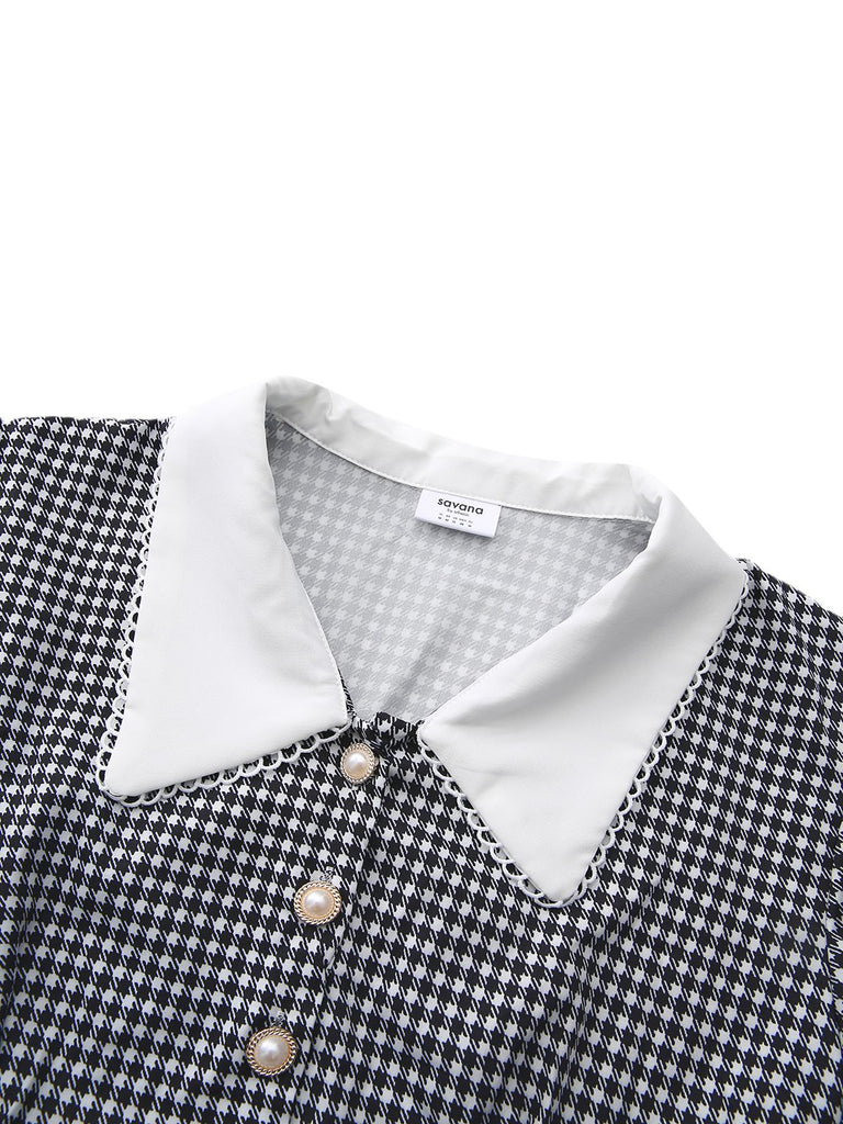 Robe noire à manches bouffantes et boutons nacrés style pied-de-poule années 1940