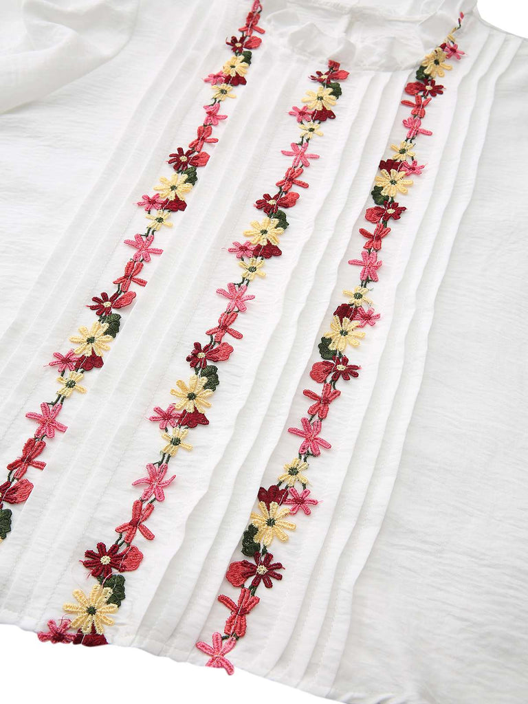 Chemisier blanc col volanté brodé de fleurs style années 1930