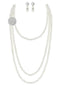 Ensemble collier et boucles d'oreilles vintage en perles superposées