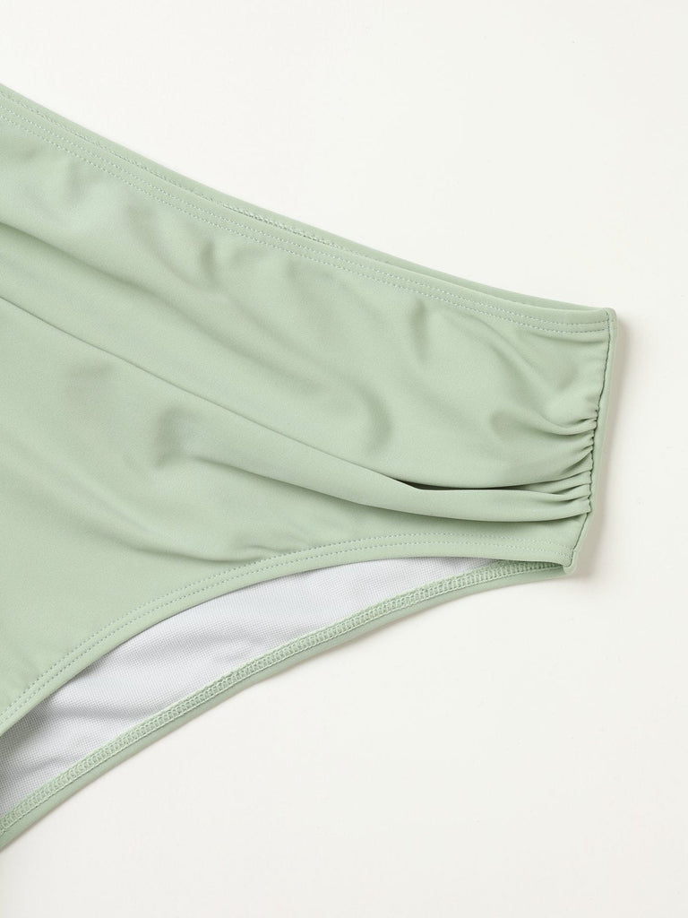 Vintage wrap bikini with crisscross top and high waist bottoms in 1950s retro style