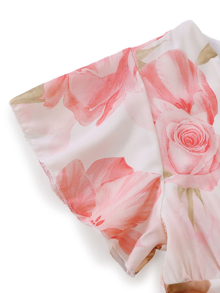 Robe longue rose à imprimé floral col en V et manches bouffantes années 1950