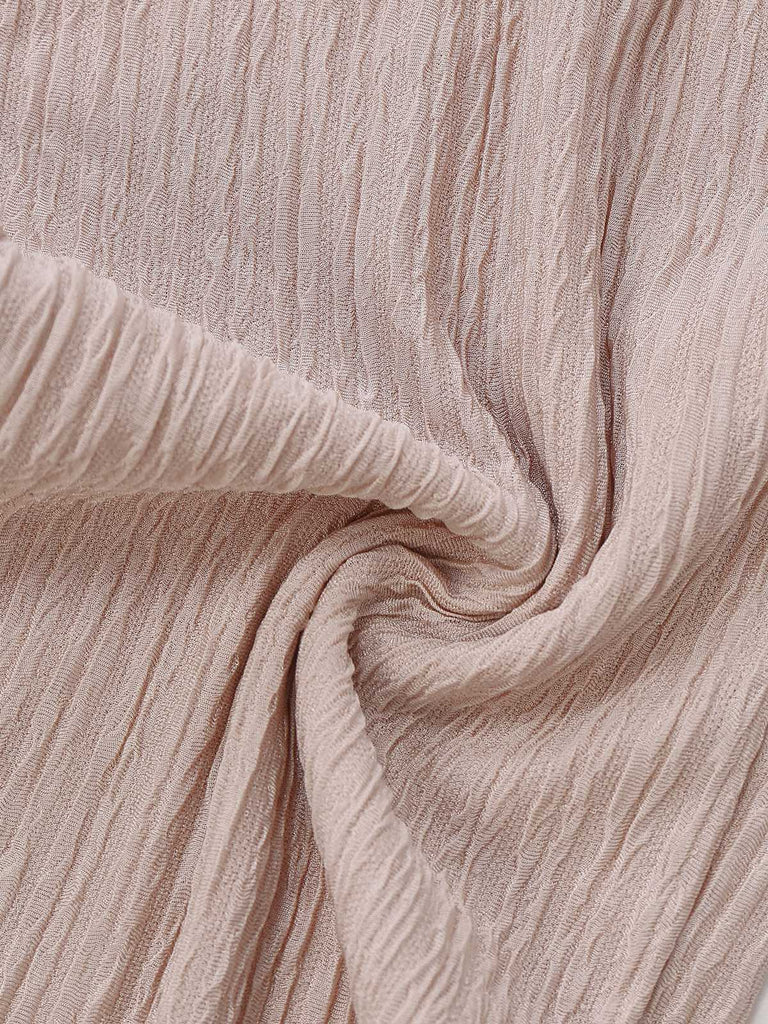 Combinaison col en V manches longues et imprimé torsadé années 1970