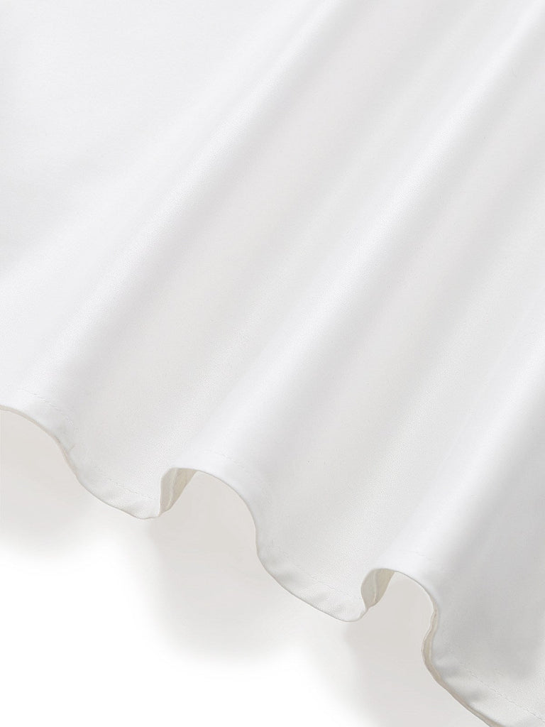 Robe blanche unie sans manches col en V boutons années 1950