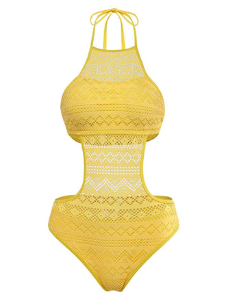 Un monokini jaune vif doté d'un haut dos nu à col montant, de superpositions de dentelle géométriques complexes et de découpes latérales.