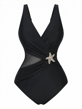 Maillot de bain rétro années 50 à imprimé étoiles de mer, avec décolleté en V et technologie gainante, idéal pour un look plage et piscine assuré.