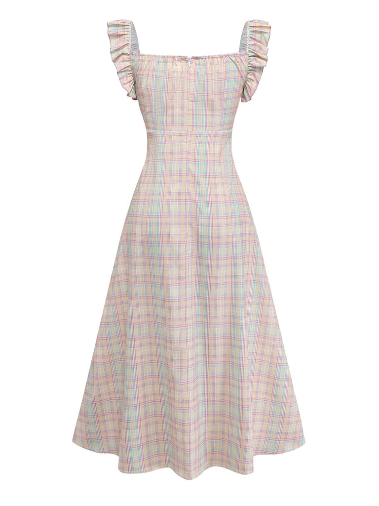 Pastel plaid swing dress with ruffled bow details and sweetheart neckline for 1950s vintage styling