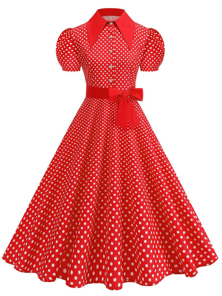Robe trapèze vintage à pois, ceinturée et à col chemise, dans un style rétro classique des années 1950.