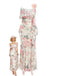 Une robe longue couleur crème ornée d'un imprimé floral romantique de roses roses, de fines bretelles spaghetti et d'un décolleté à volants, présentée avec une illustration de mode rétro.