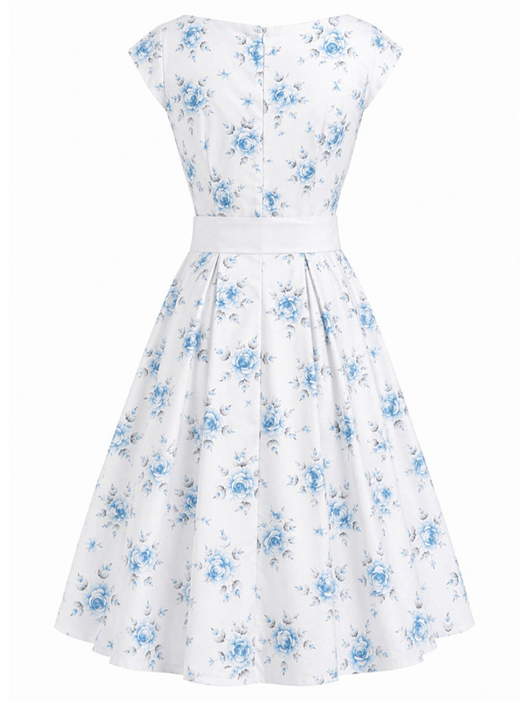 Robe jaune à fleurs antique col bateau ceinturée années 1950