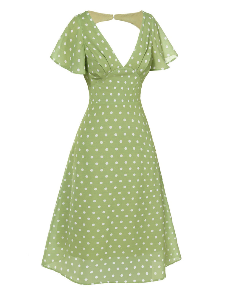 Robe verte à pois ajourés dans le dos des années 40
