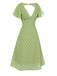 Robe verte à pois ajourés dans le dos des années 40