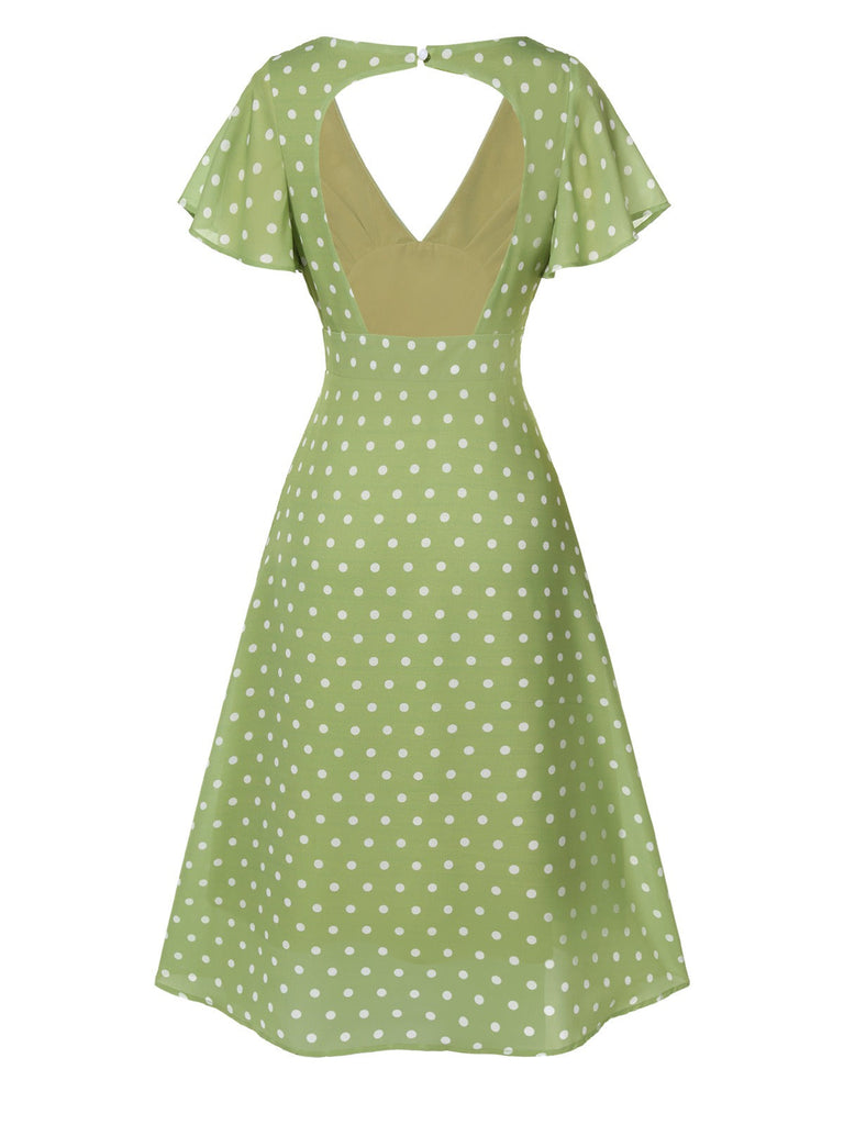 Robe verte à pois ajourés dans le dos des années 40